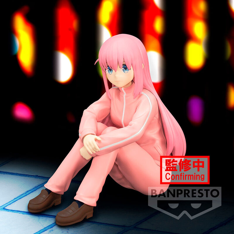 Anime character figurine in pink outfit with 'BANPRESTO' branding on a colorful blurred background