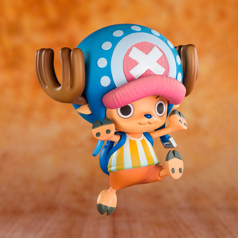 Colorful figurine with a blue hat featuring a white 'X' on an orange background