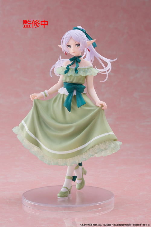 Figurine of a character in a green dress with white hair on a pink background