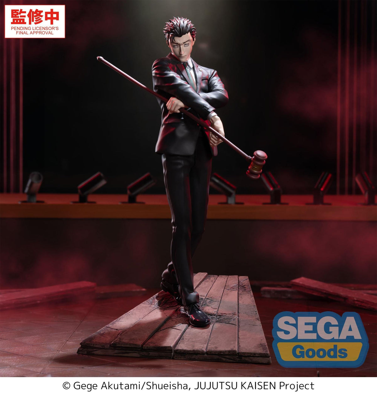Statue of a character from 'Jujutsu Kaisen' on a wooden platform with red curtains in the background, featuring the Sega Goods logo.