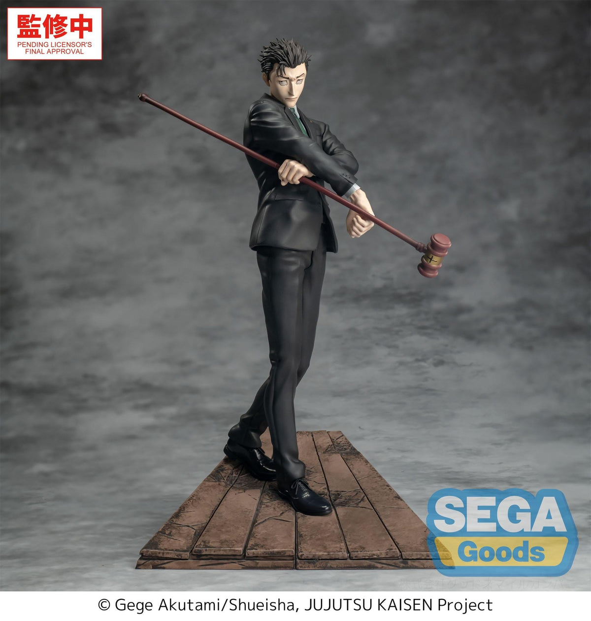 Figurine of a character from 'Jujutsu Kaisen' holding a rod on a gray background with Sega Goods logo.