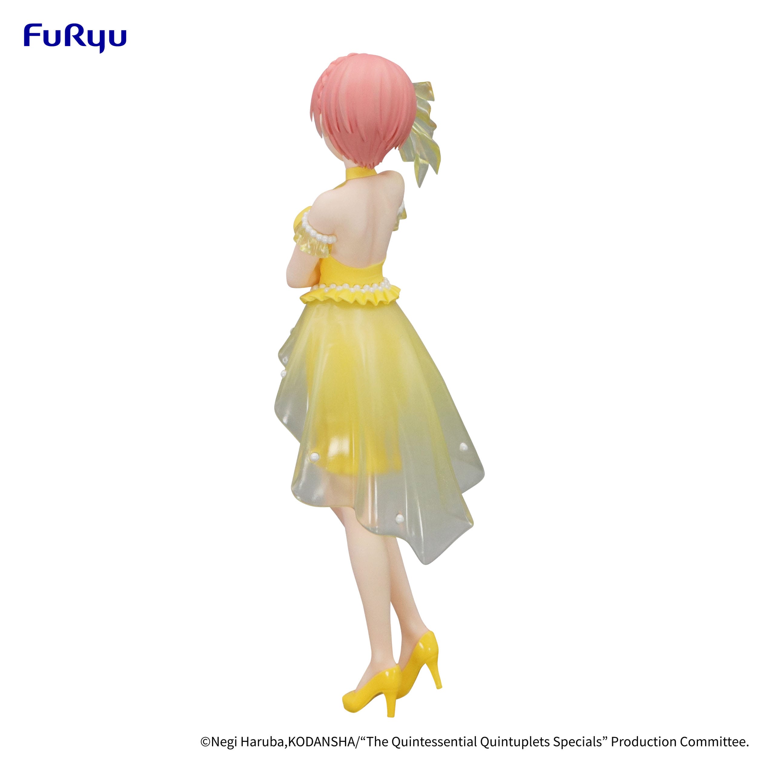 Figurine of a character in a yellow dress with pink hair on a white background, featuring the Fururyu brand.