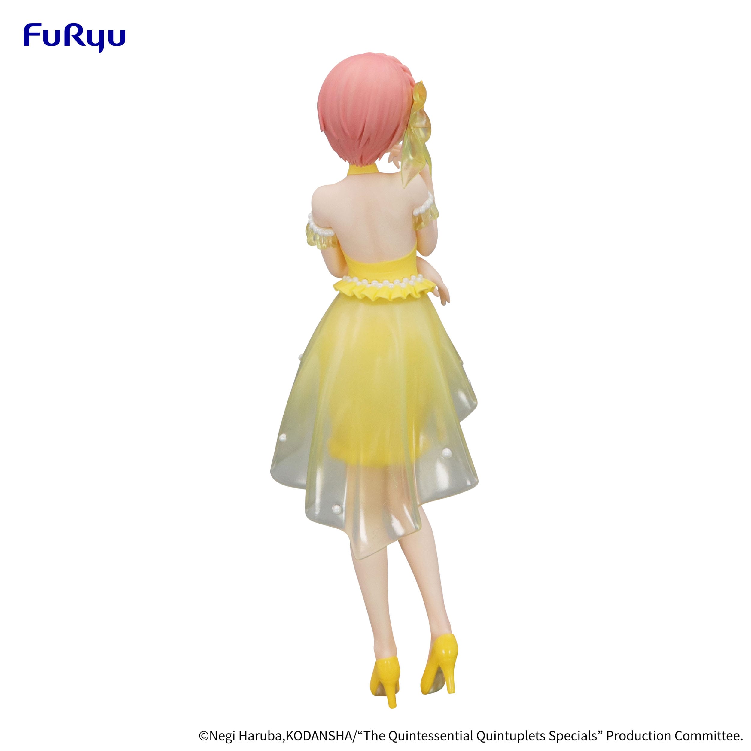Figurine of a character in a yellow dress with pink hair on a white background, featuring the Fururyu brand.