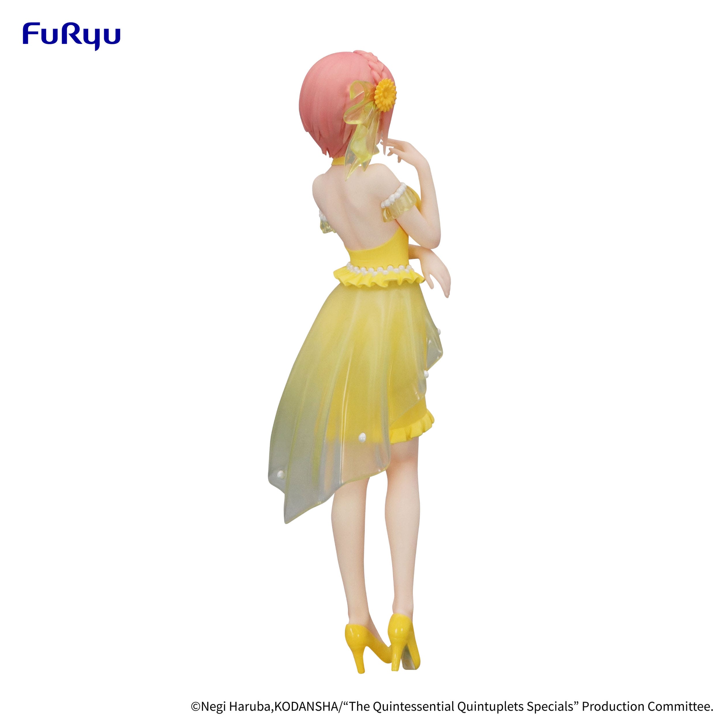 Figurine of a character in a yellow dress with pink hair on a white background, branded with Fururyu.