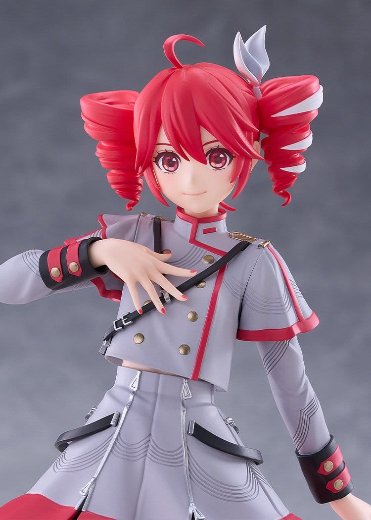 A collectible anime figurine of a character with bright pink hair styled in twin buns, wearing a gray and red military-inspired uniform with black straps and gold buttons, posed against a neutral gray studio background.