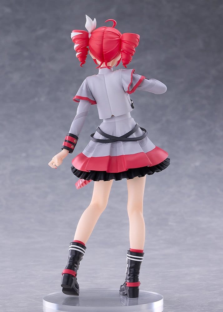 A collectible anime figurine of a female character shown from the back, wearing a gray and red school uniform with black accents, standing on a clear circular base against a gray studio background.