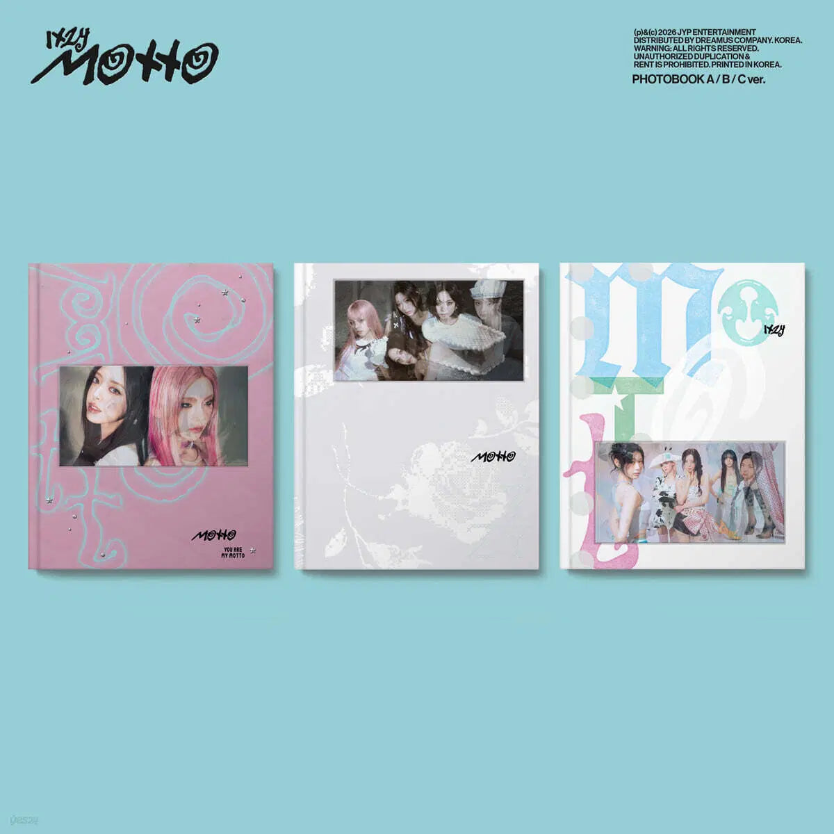 Three photobooks with colorful designs and images of a girl group on a light blue background.