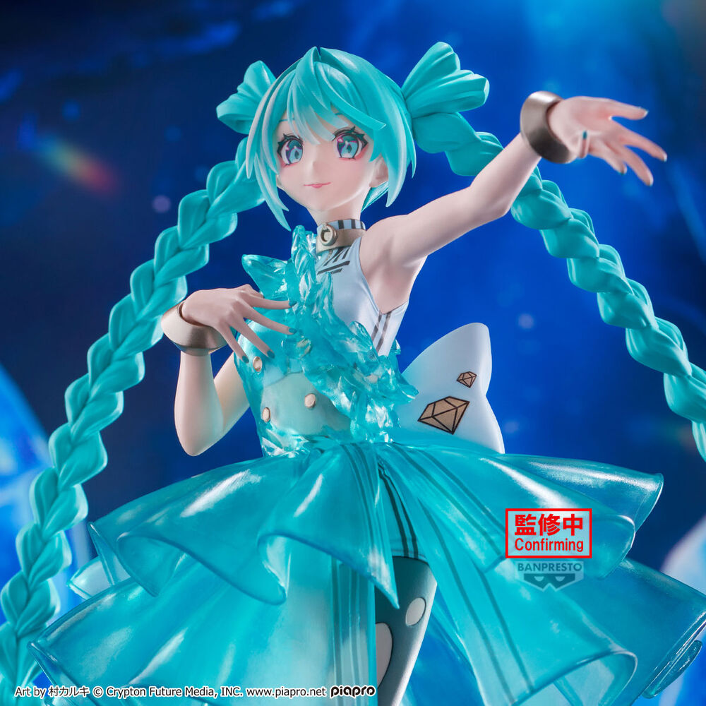 Anime character figurine with teal hair and dress against a blue background