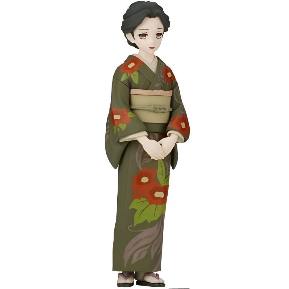 Figurine of a person wearing a traditional kimono with floral patterns on a white background
